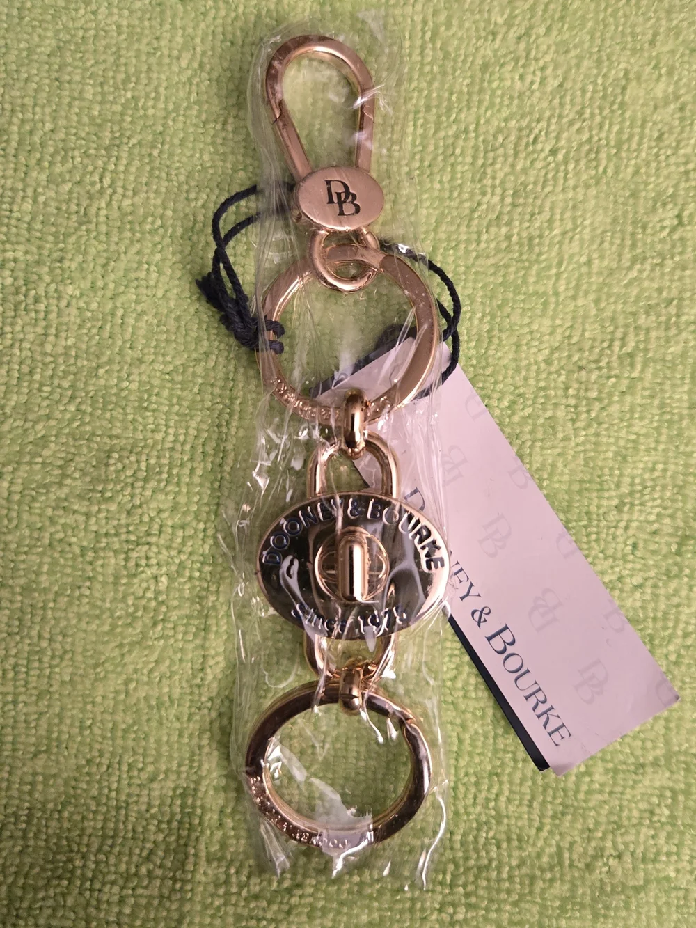 Dooney & Bourke Gold Logo Turnlock Valet Keychain Charm NWT